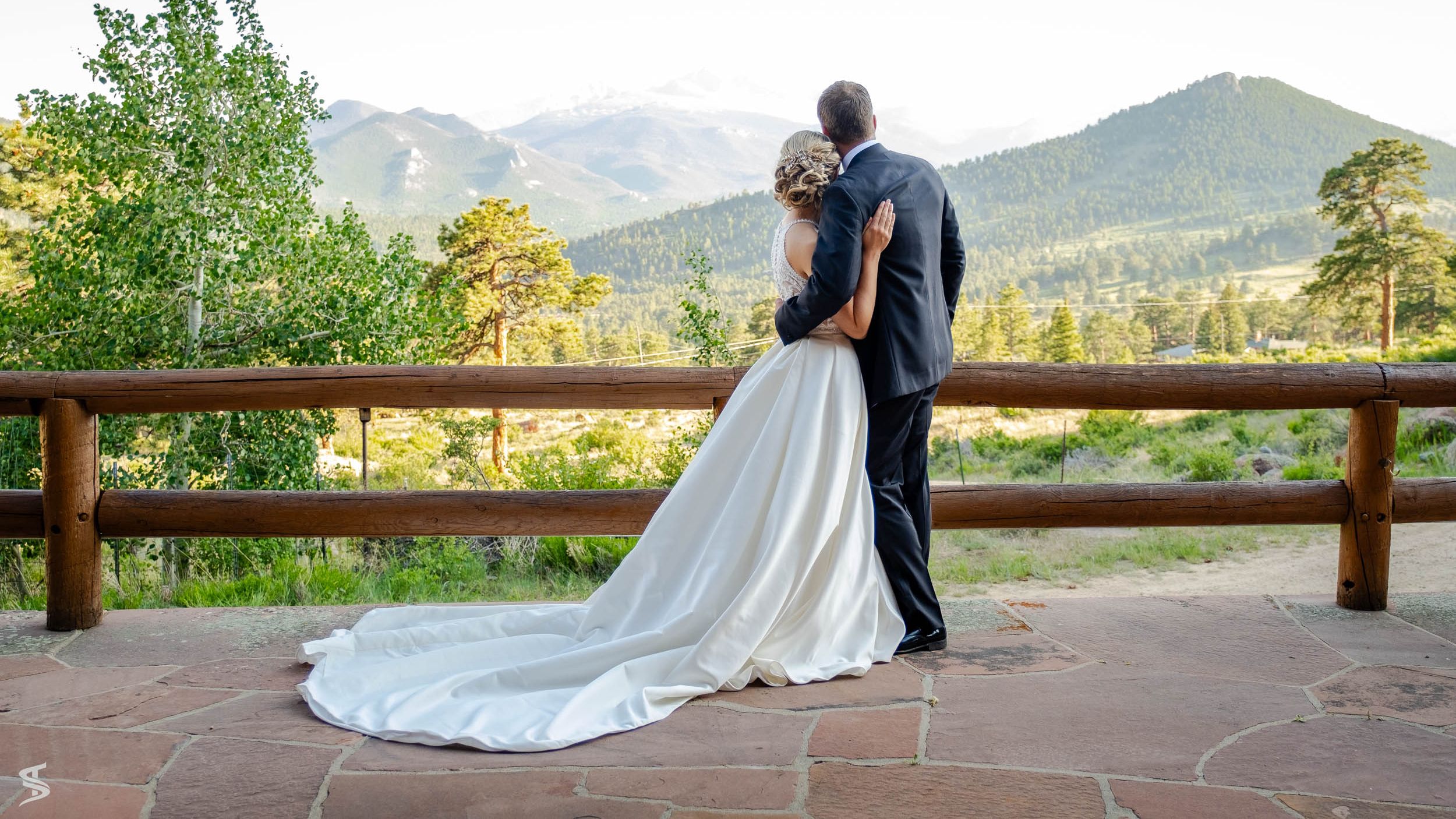 People weddings laying in grass