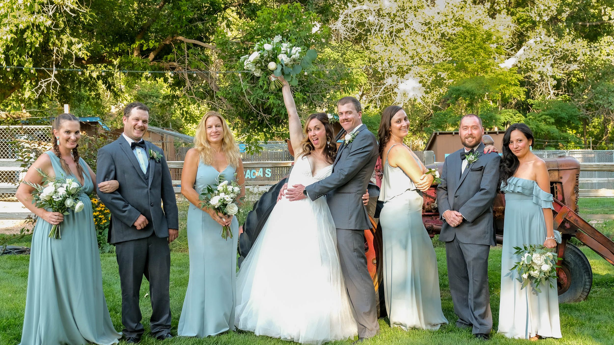 People weddings laying in grass