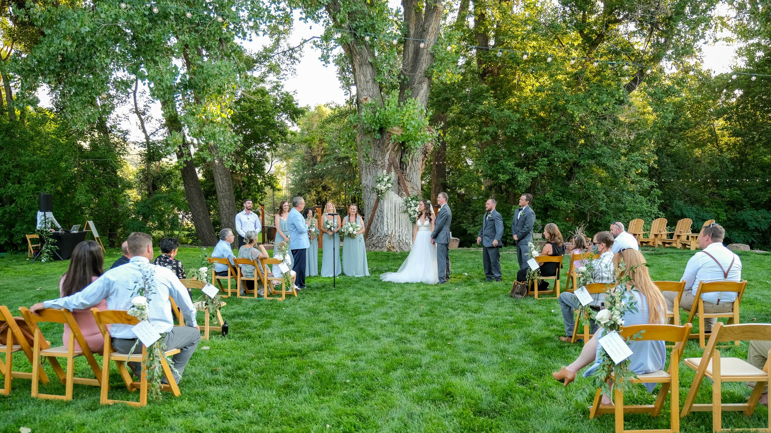 People weddings laying in grass