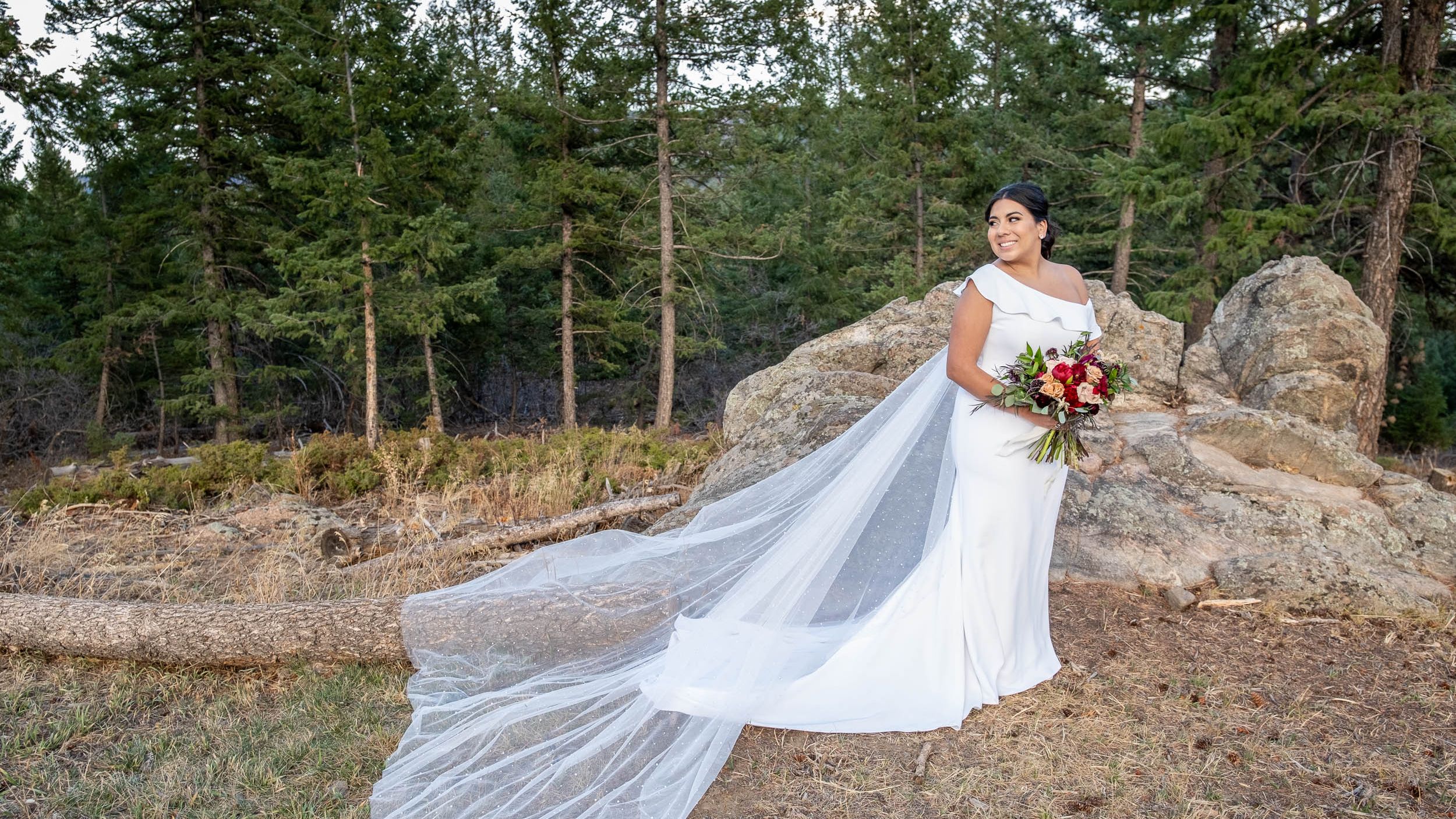 People weddings laying in grass